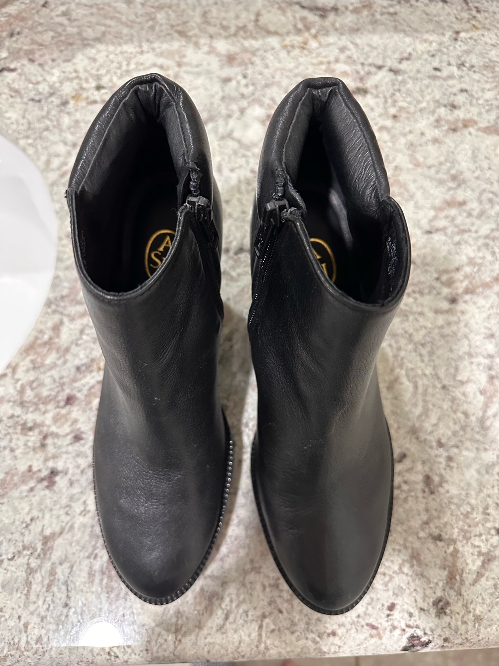 Never worn Ash "Gong" Black Leather Hidden Wedge Booties. New. Size 37. $395